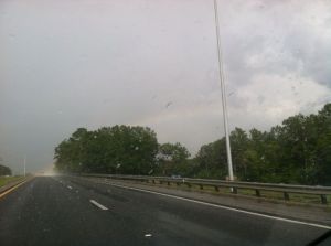 rainbow through storm